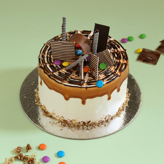 Gems Sprinkled Caramel Cake