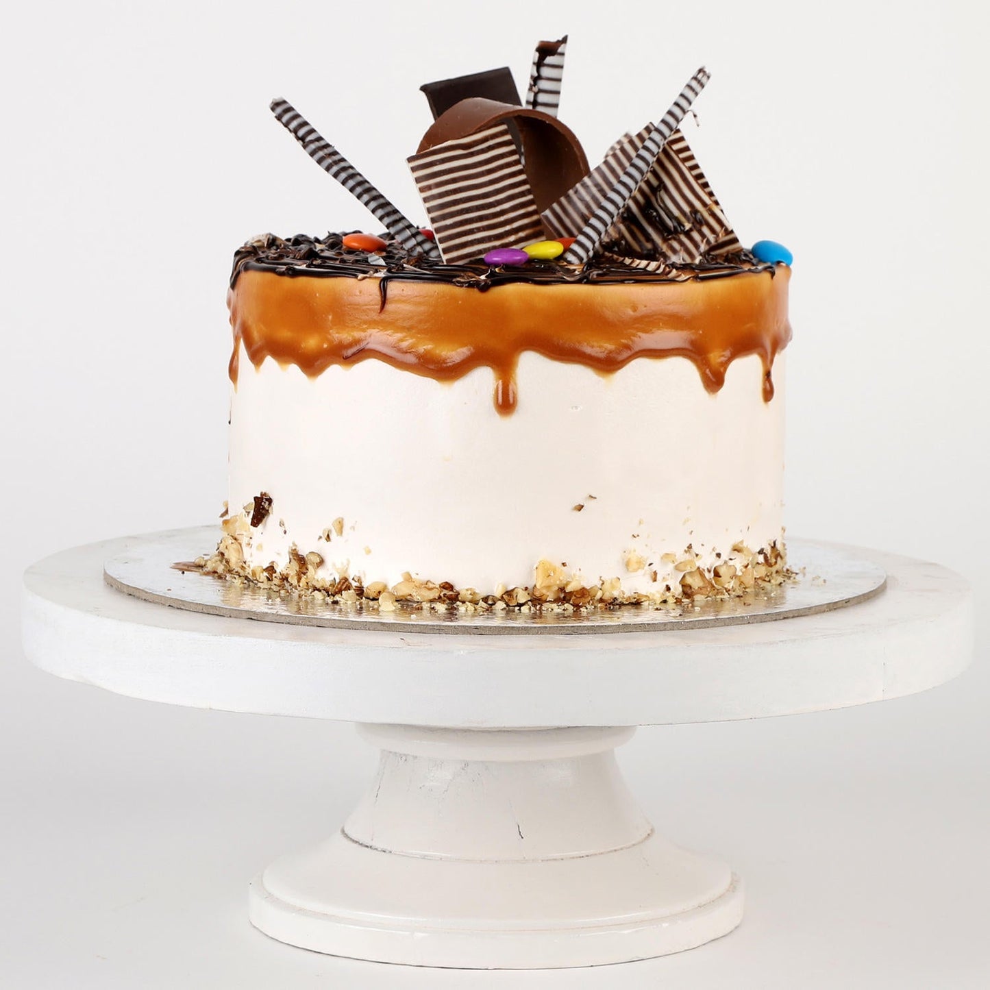 Gems Sprinkled Caramel Cake