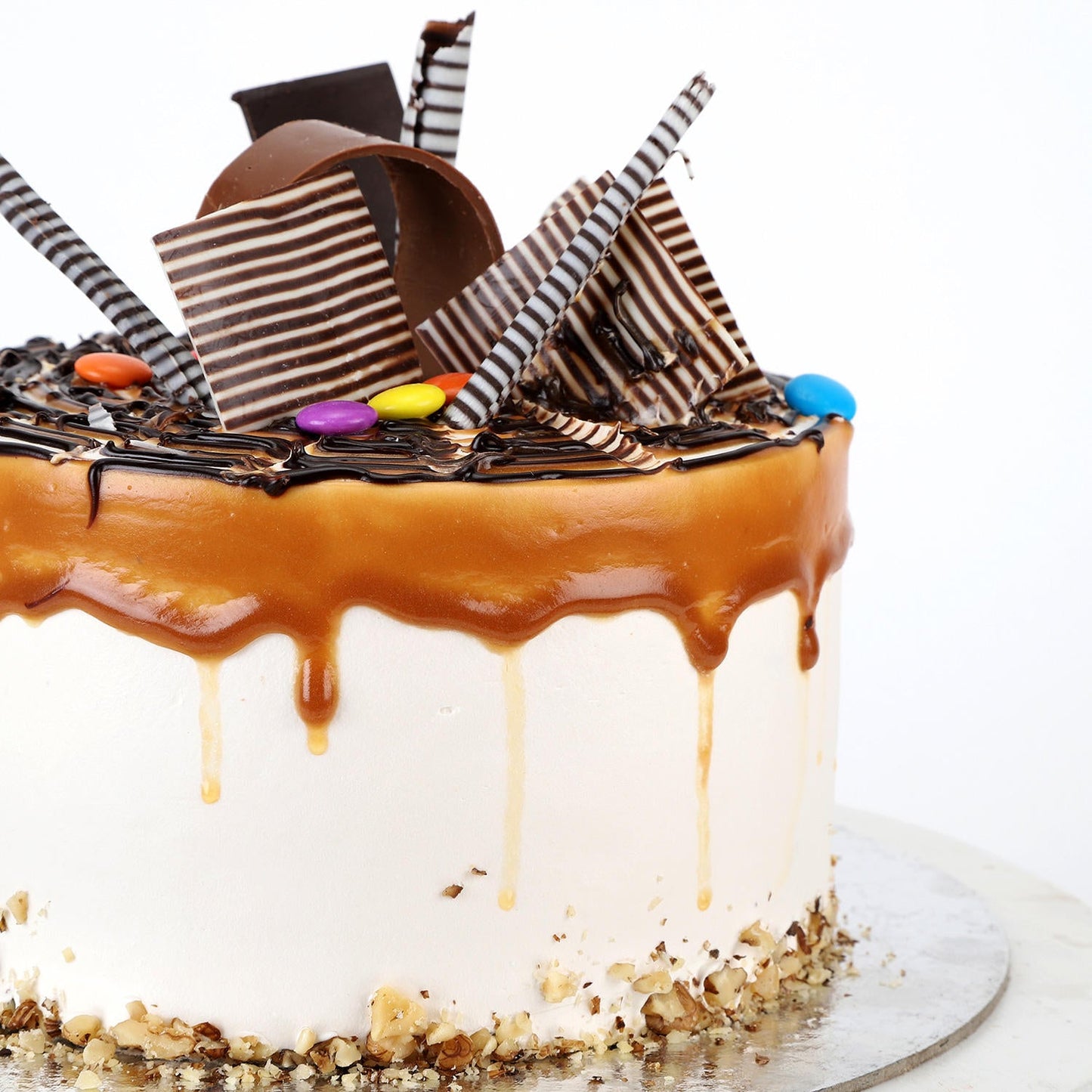 Gems Sprinkled Caramel Cake