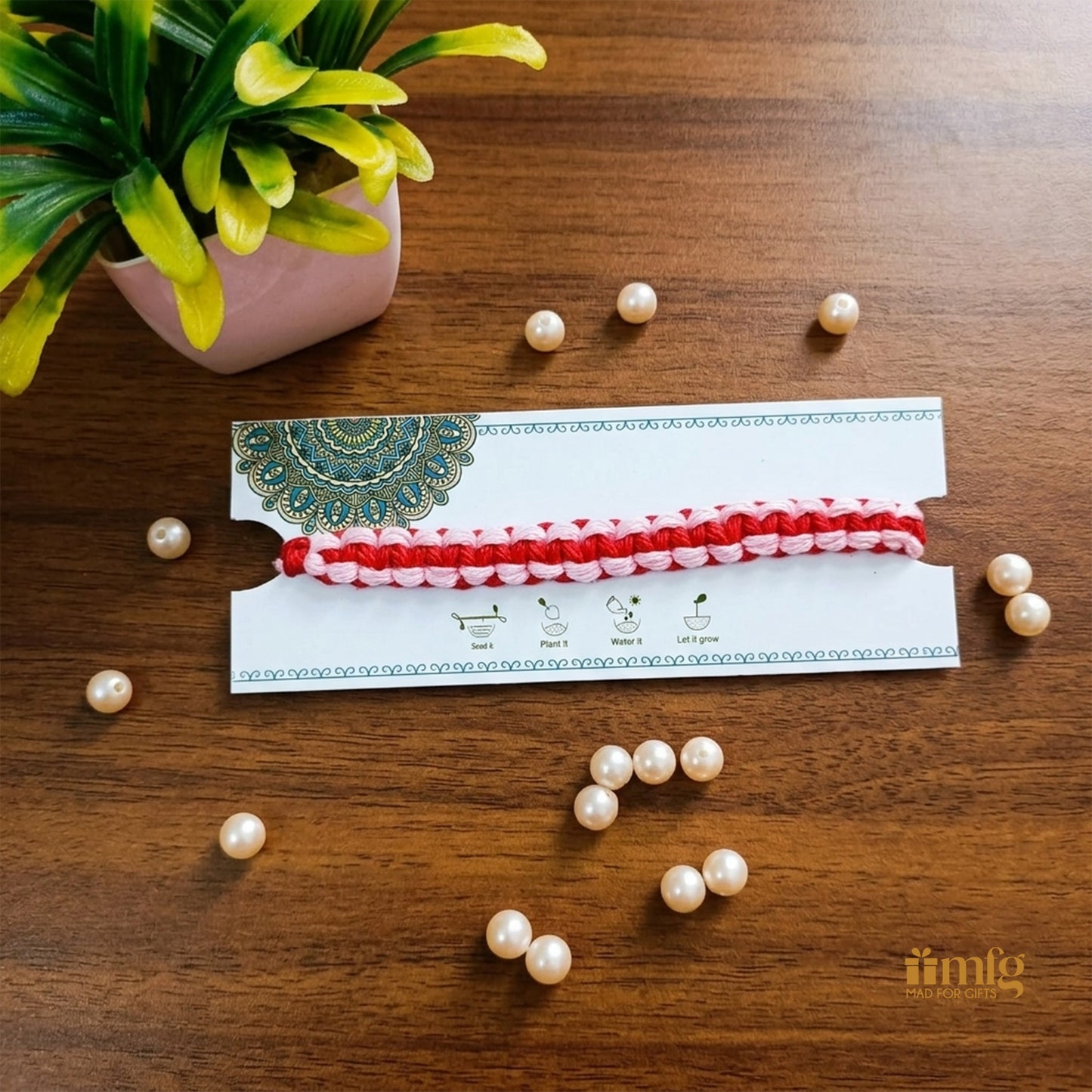 Eco-Friendly Red & Light Pink Braided Seed Rakhi