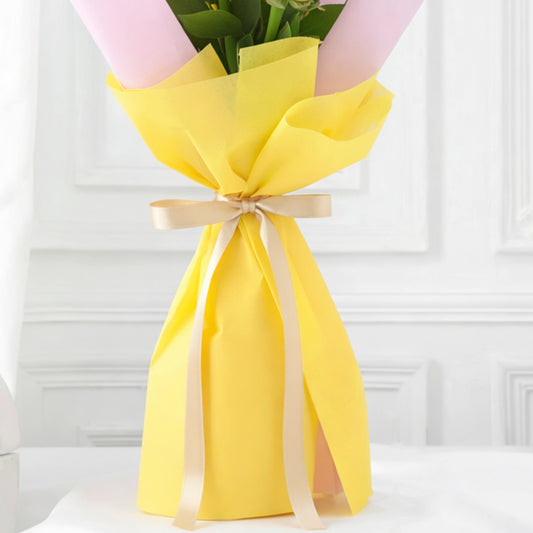 Soft pink roses in delicate wrapping