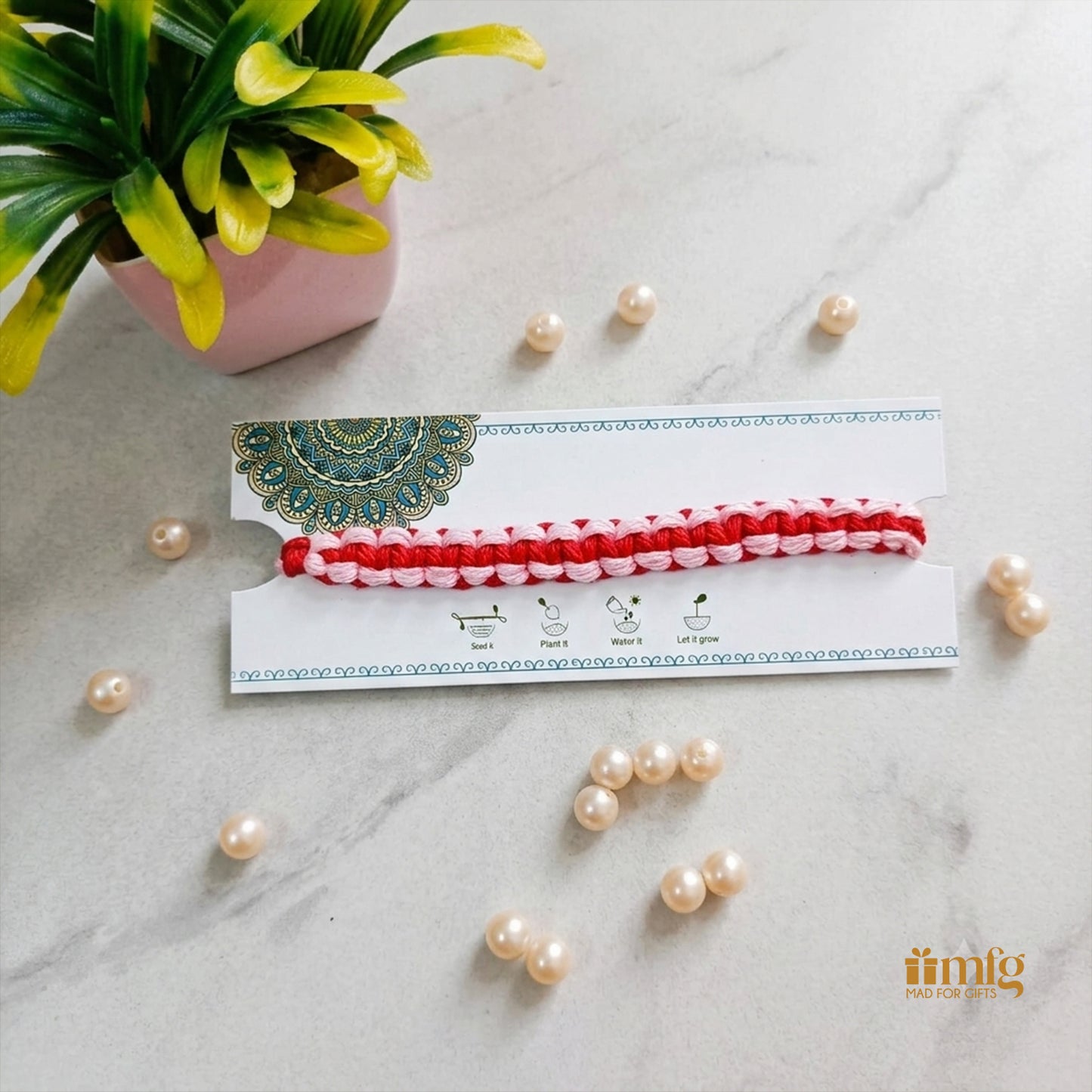 Eco-Friendly Red & Light Pink Braided Seed Rakhi