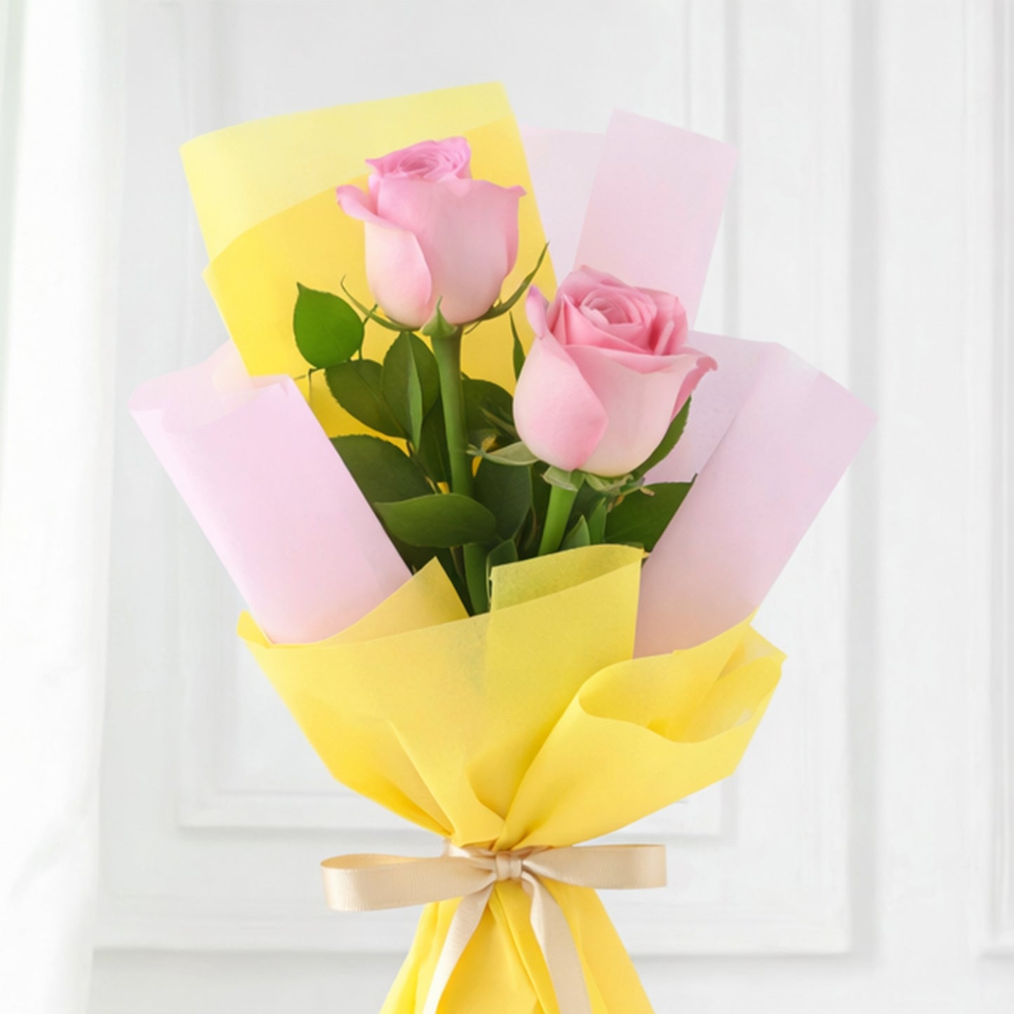 Soft pink roses in delicate wrapping